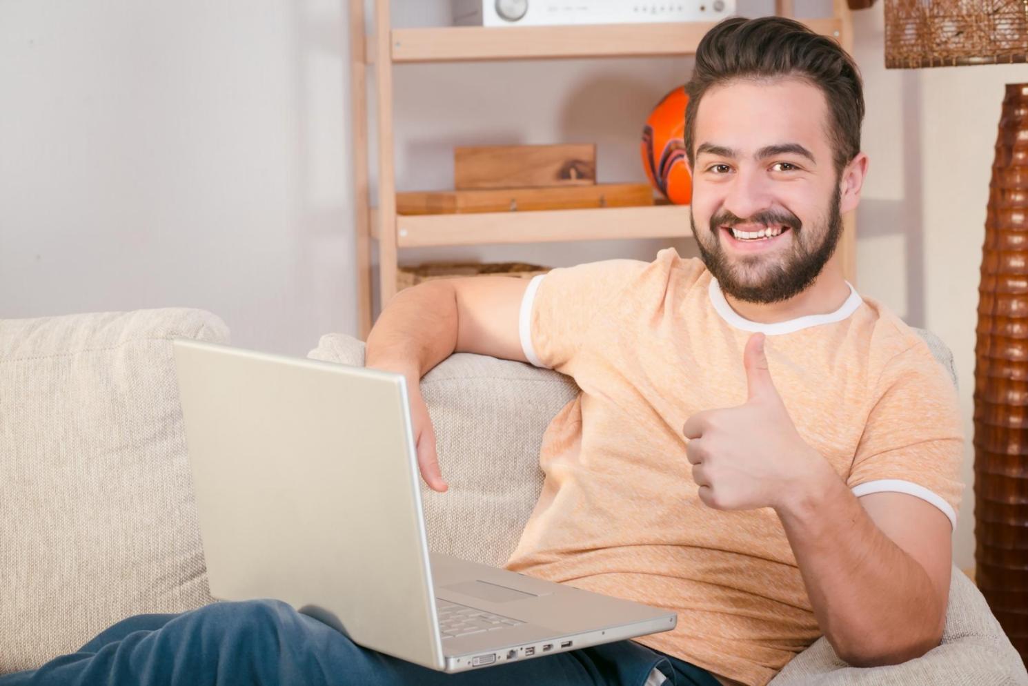 Student working through course materials on laptop