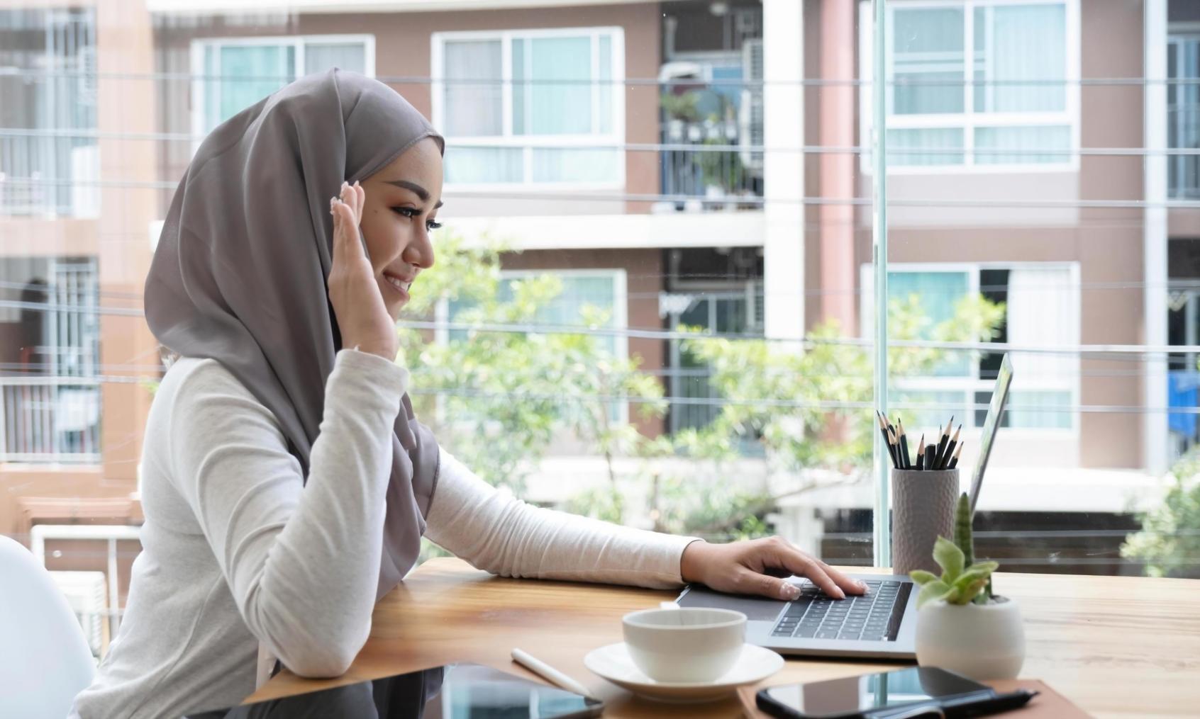 Financial recovery planning session with documents and calculator