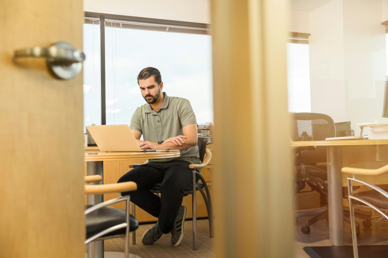Laptop and notebook with income planning notes